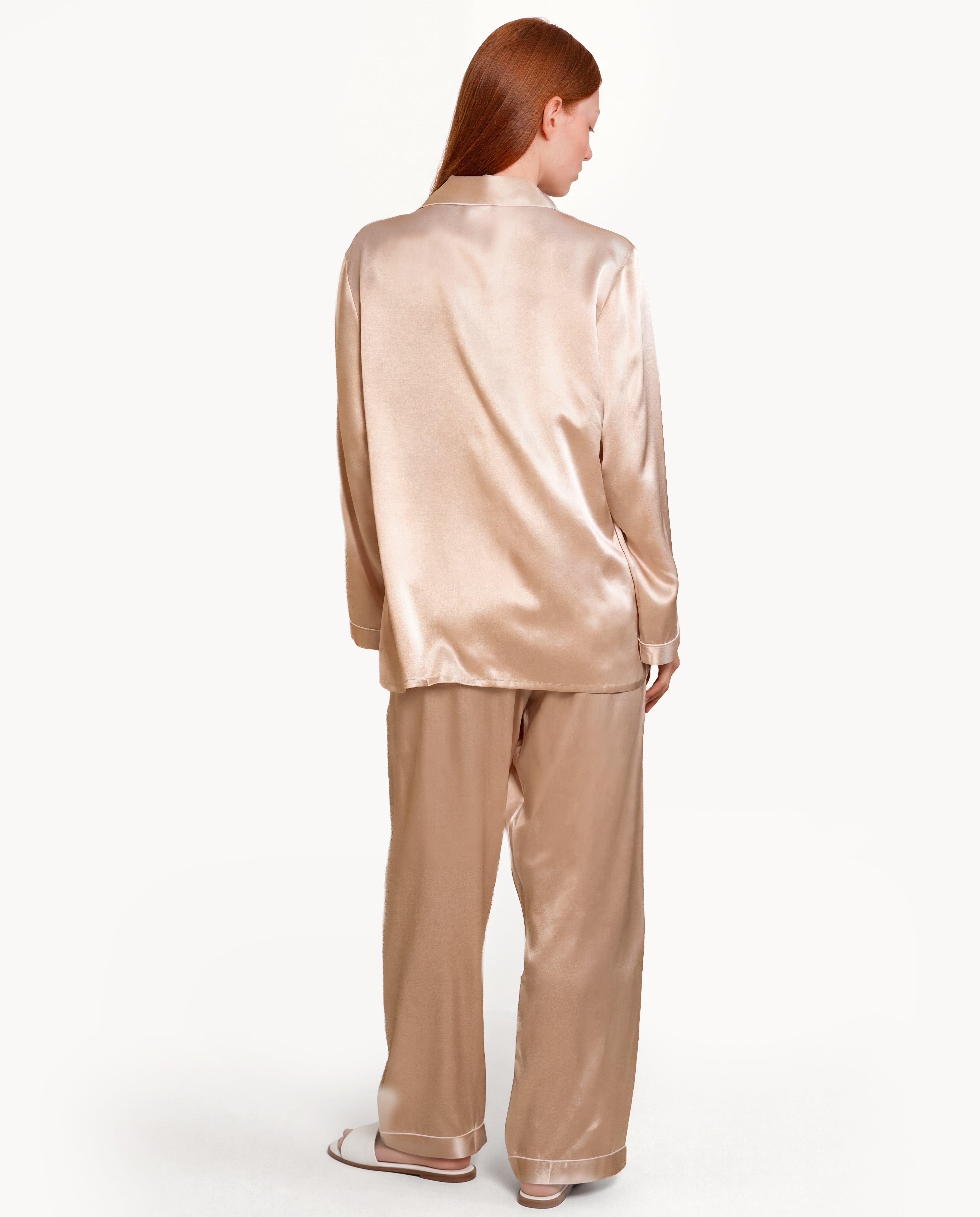 Back view of model in Champagne silk pajamas, premium silk material sleep in shirt and pajama shirt for luxury silk sleepwear.